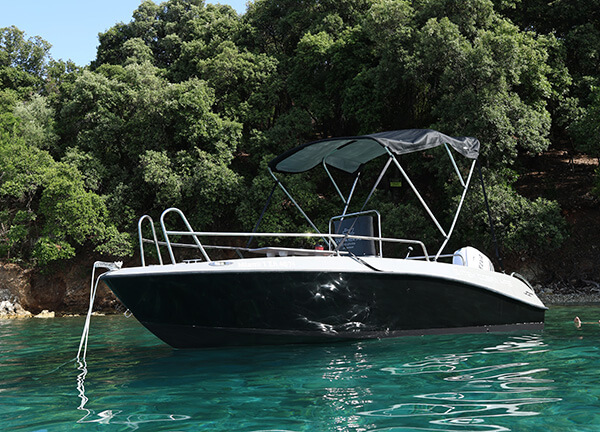 A no-license required boat in a beautiful bay