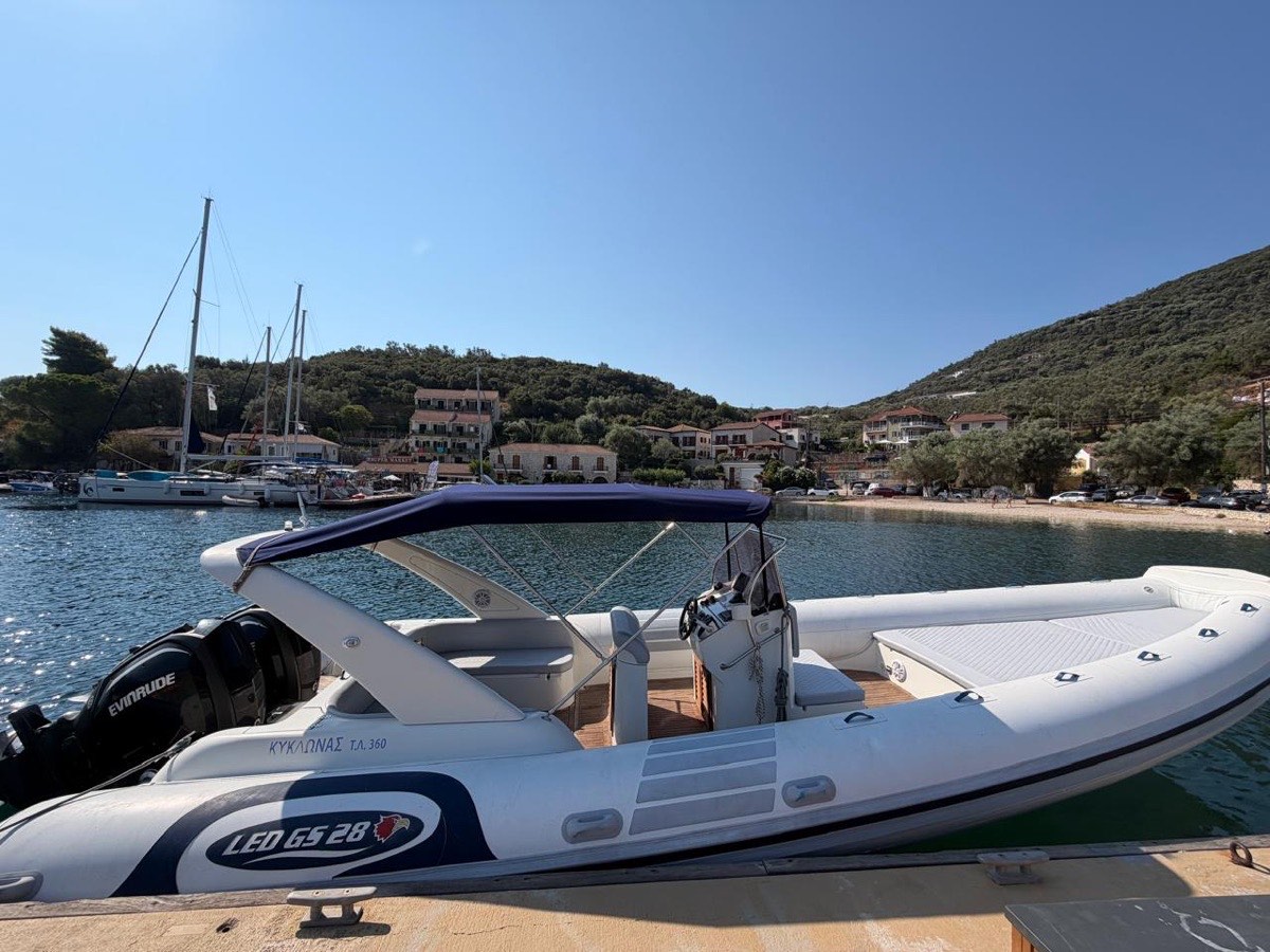 Kyklonas, a 9m Nautica Led RIB with twin Evinrude engines, moored in Sivota harbour