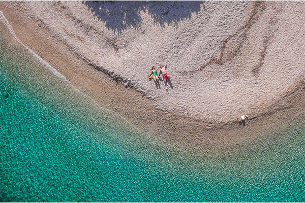 The stunningly clear, turquoise water of Piscine Beach in Lefkada.